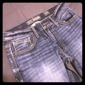 buckle slim straight jeans